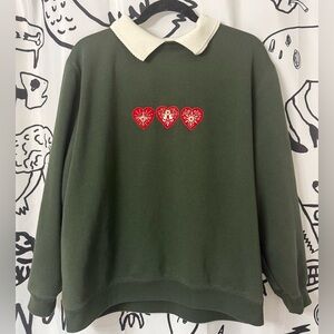 Northern Reflections Green Sweatshirt with Red Heart Accents
